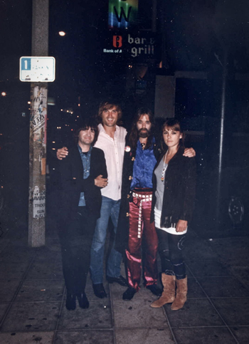 Legendary L.A. DJ Rodney Bingenheimer, Sid Griffin, Sky Saxon and Laura Benson on the Sunset Strip, 1986.