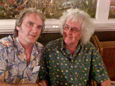 Our hero shakes hands with UK blues & bluegrass great Wizz Jones in Battersea, June 2010, after a great session at Guitar Classics shop.