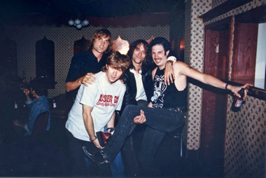 Our hero, Warner Bros.' PR genius Rick Gershon, REM's Peter Buck and Long Ryder Greg Sowders look silly at Raji's in Hollywood, 1987.