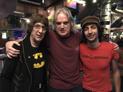 June 8, 2019, London, saw Our Hero attended yet another gig by the legendary Flamin’ Groovies. Led by Cyril Jordan since 1966, the Groovies are unstoppable. Here’s Cyril, Sid, and their shared soundman Fabio Clemente after the gig.