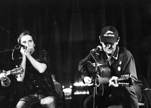 Sid Griffin on harmonica backing up Bob Neuwirth in Austria circa 1997